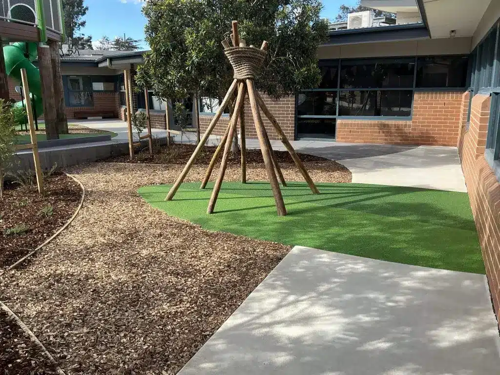 Wooden structure on green grass