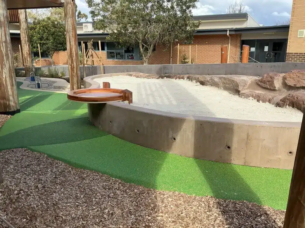 Outdoor play sandpit area