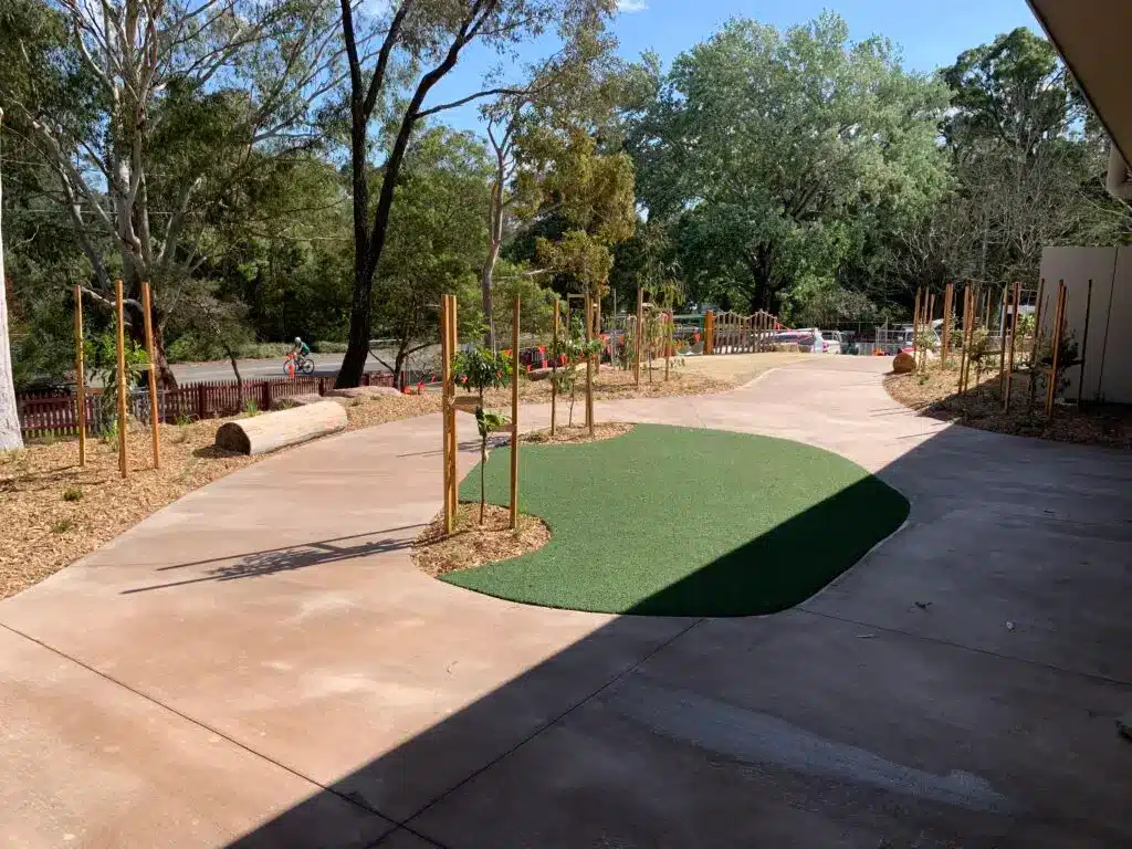 Outdoor landscaped area with trees