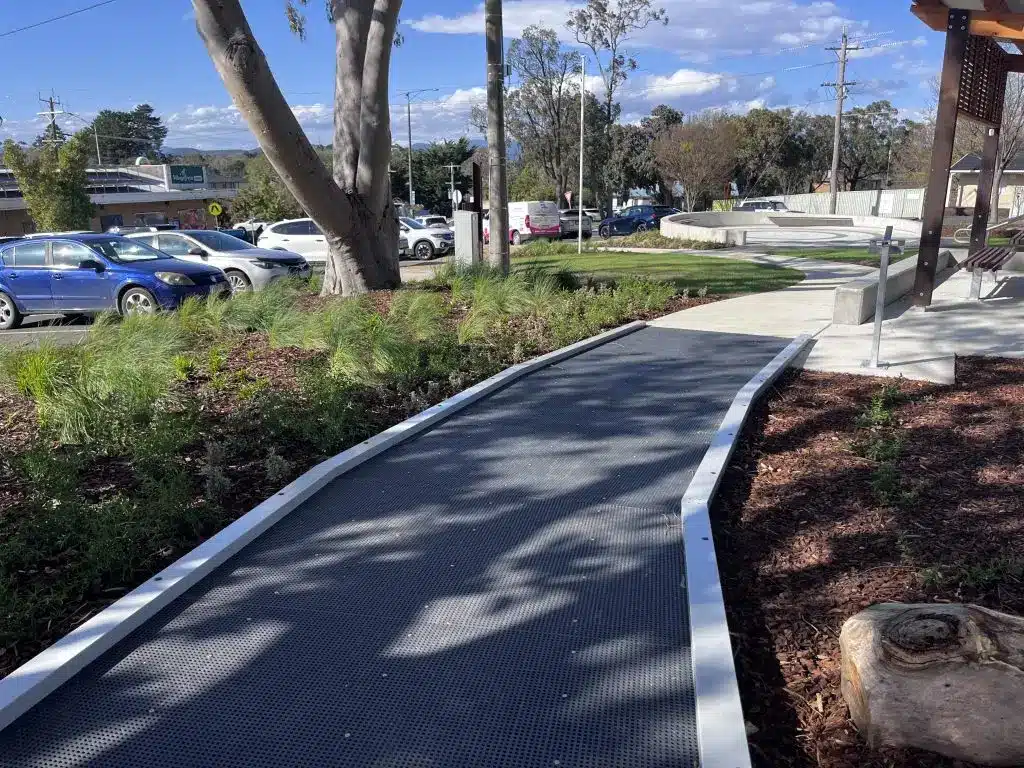 Park pathway with car park
