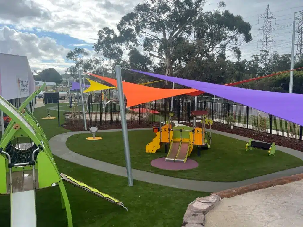 Bright outdoor playground with shade sails